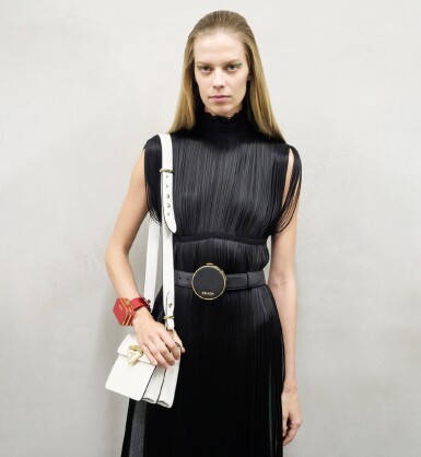 View full screen - View 1 of Lot 42. PRADA | FLUID FRINGE DRESS, VANITY BELT AND BRACELET, WORN BY LEXI BOLING.