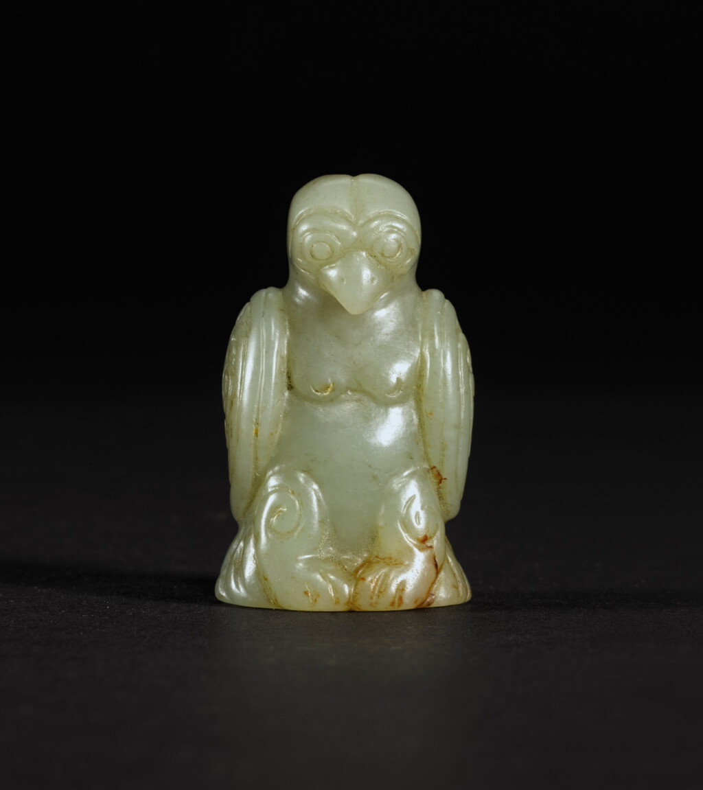 View full screen - View 1 of Lot 235. A SMALL CELADON JADE OWL SONG DYNASTY- MING DYNASTY | 宋至明 青玉鶚.