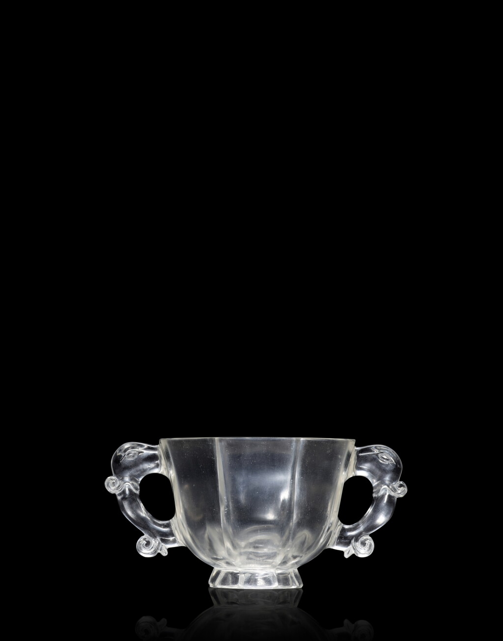View full screen - View 1 of Lot 3843. A rare rock crystal octagonal handled cup, Wheel-cut mark and period of Qianlong | 清乾隆 水晶八方雙龍耳盃 《乾隆年製》款.