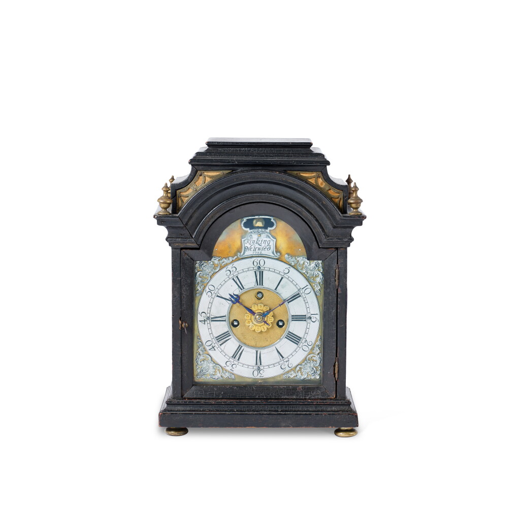 View full screen - View 1 of Lot 1041. A German Baroque brass-mounted ebonized wood table clock by Kintzing, Neuwied, mid-18th century.