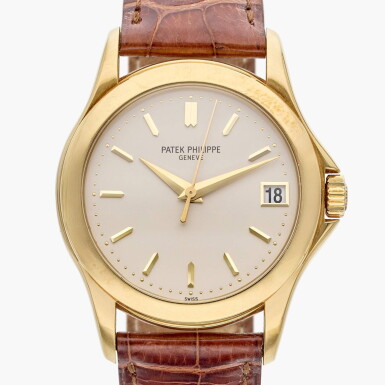 View full screen - View 1 of Lot 335. Reference 5107J-001 Calatrava | A yellow gold automatic wristwatch with date, Circa 2000.