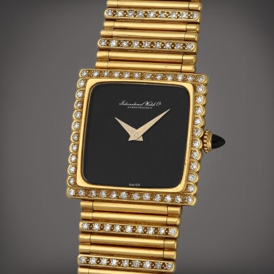 View full screen - View 1 of Lot 20. A yellow gold and diamond-set wristwatch with bracelet | Circa 1972.