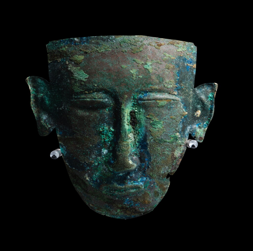 View full screen - View 1 of Lot 126. A bronze mask, Liao dynasty | 遼 青銅面具.