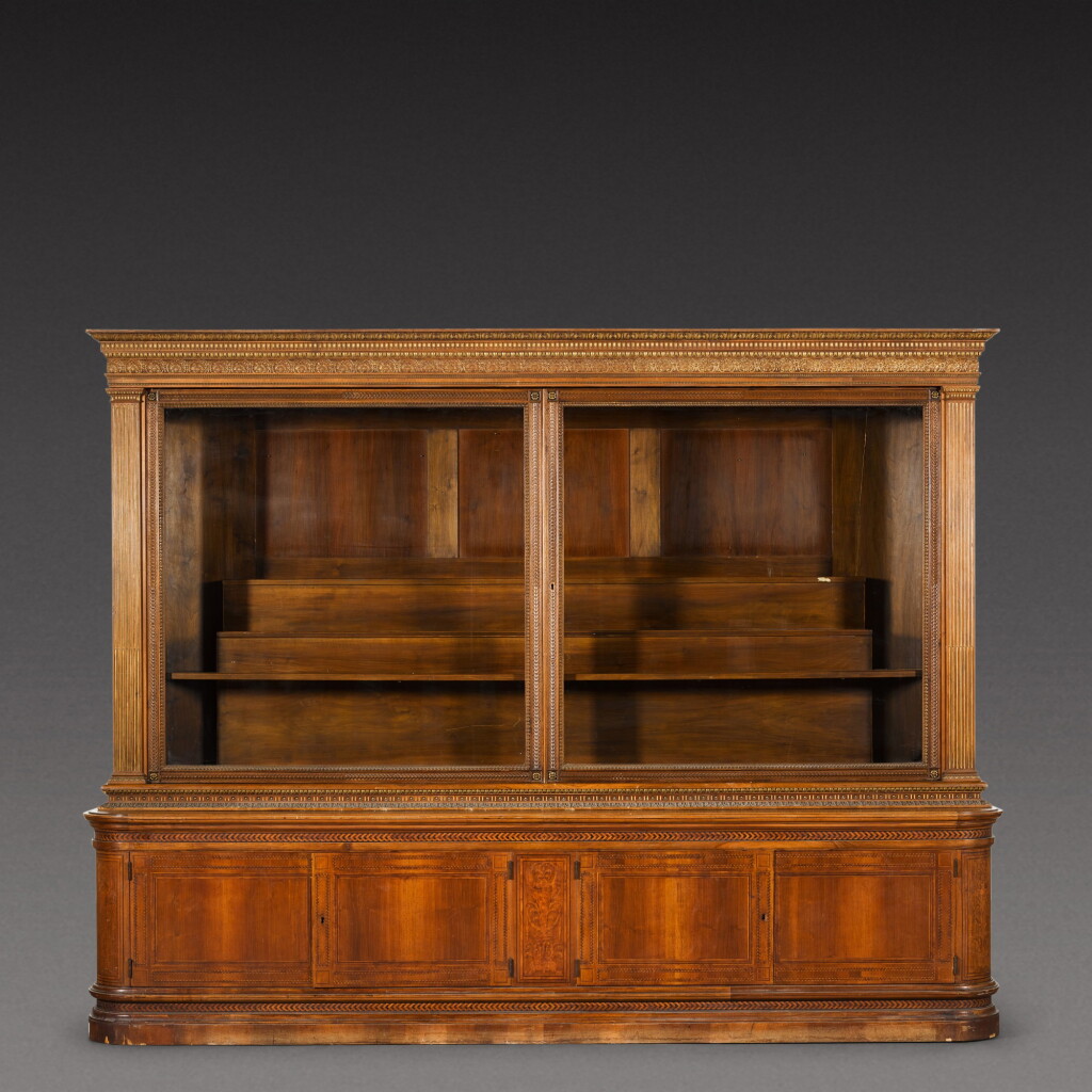 View full screen - View 1 of Lot 178. An Austrian parcel-gilt intarsia inlaid walnut display cabinet, late 19th century.