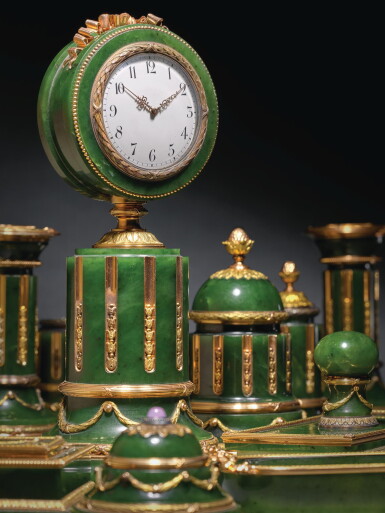 View full screen - View 1 of Lot 34. A Highly Important Fabergé Varicolored Gold-Mounted Nephrite Desk Set, Workmaster Henrik Wigström, St Petersburg, 1903-1912.