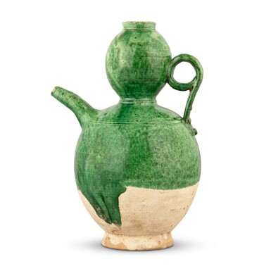 View full screen - View 1 of Lot 201. A green-glazed pottery 'double-gourd' ewer, Liao dynasty | 遼 綠釉葫蘆形執壺.