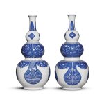 A pair of blue and white triple-gourd 'taotie' vases, Qing dynasty, 19th century | 清十九世紀 青花仿古饕餮紋三節葫蘆瓶一對