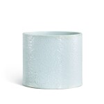 A carved white-glazed 'lotus' brushpot, Qing dynasty, Kangxi period 清康熙 白釉刻纏枝蓮紋筆筒 《成化年製》仿款