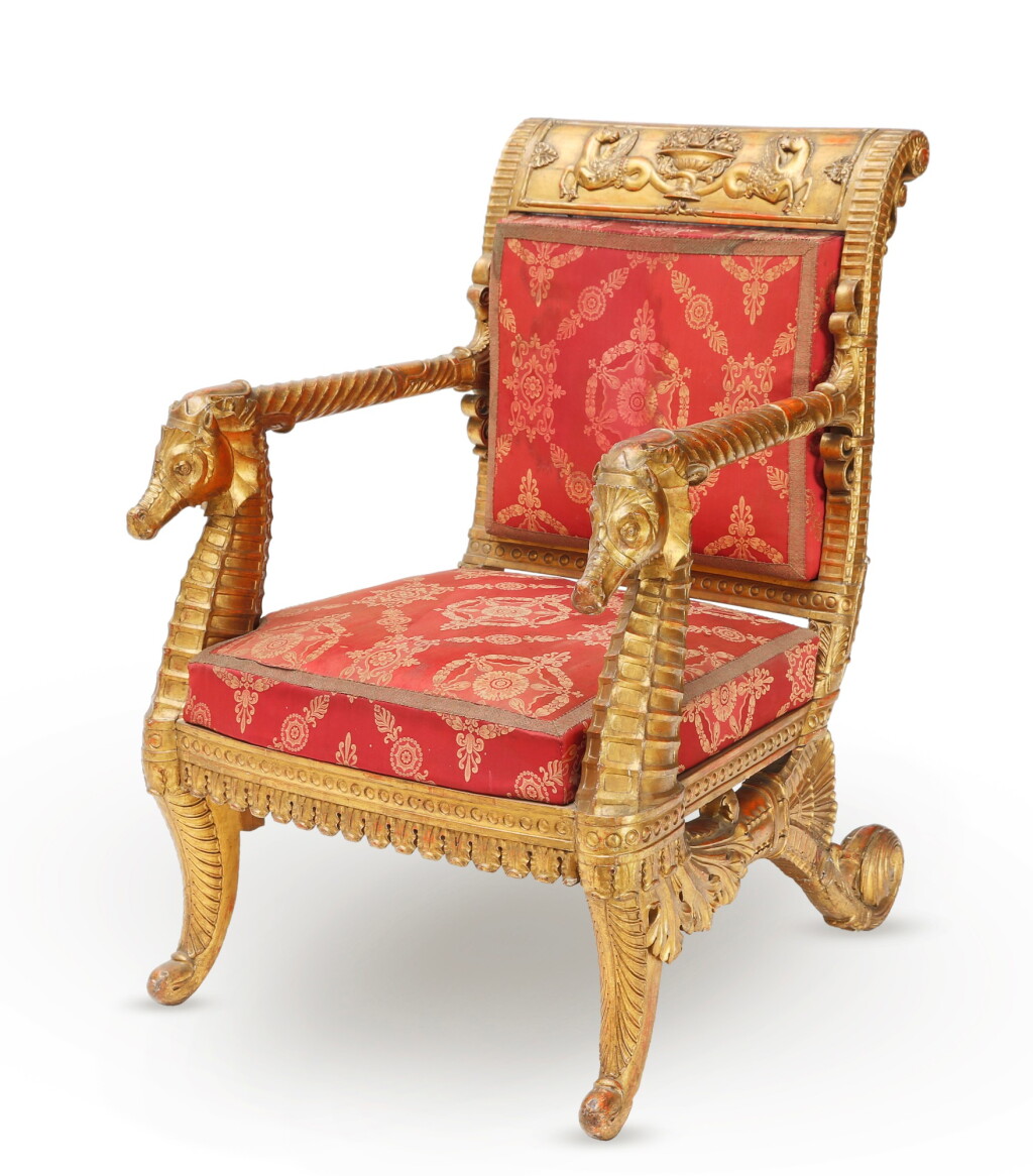 View full screen - View 1 of Lot 5. AN ITALIAN GILTWOOD ARMCHAIR, SECOND QUARTER OF THE 19TH CENTURY | FAUTEUIL AUX HIPPOCAMPES EN BOIS SCULPTÉ ET DORÉ, TRAVAIL ITALIEN DU DEUXIÈME QUART DU XIXE SIÈCLE.