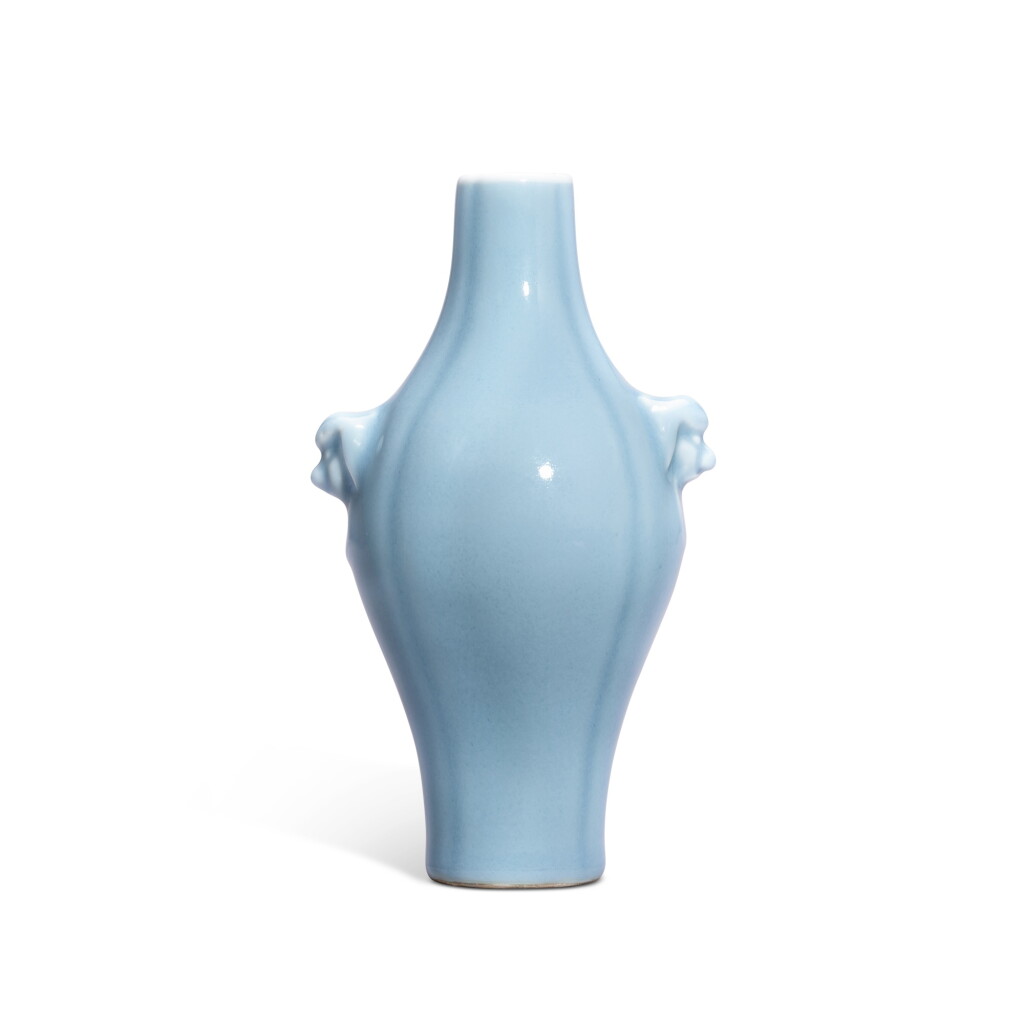 View full screen - View 1 of Lot 9360. A clair-de-lune-glazed handled 'melon' vase, Qing dynasty, 19th century | 清十九世紀 天藍釉鋪首耳瓜棱瓶 《大清乾隆年製》仿款.