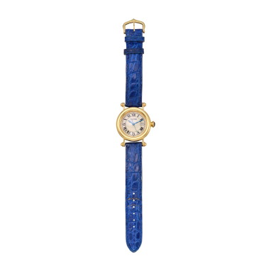 View full screen - View 1 of Lot 253. Gold and Sapphire 'Diabolo' Wristwatch.