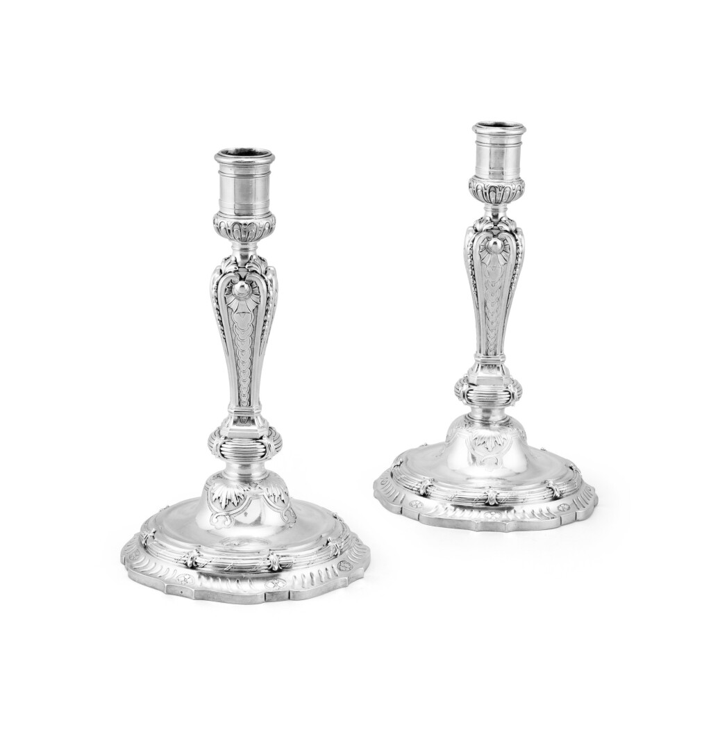 View full screen - View 1 of Lot 350. A pair of silver candlesticks, Gilles Gouel, Paris, 1734-1735 | Paire de flambeaux en argent par Gilles Gouel, Paris, 1734- 1735.