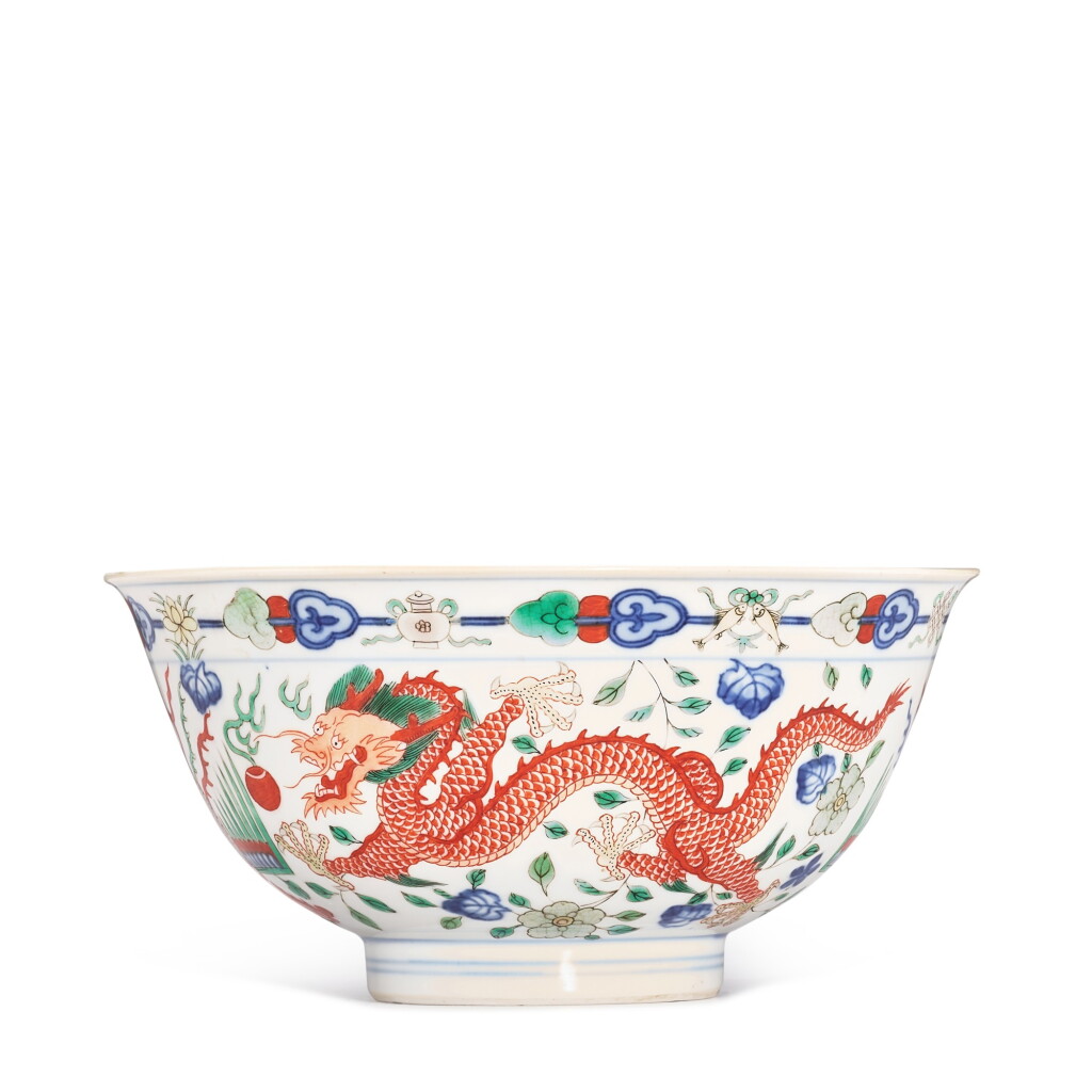 View full screen - View 1 of Lot 412. A fine wucai 'dragon and phoenix' bowl, Seal mark and period of Qianlong 清乾隆 五彩龍鳳呈祥紋盌 《大清乾隆年製》款.