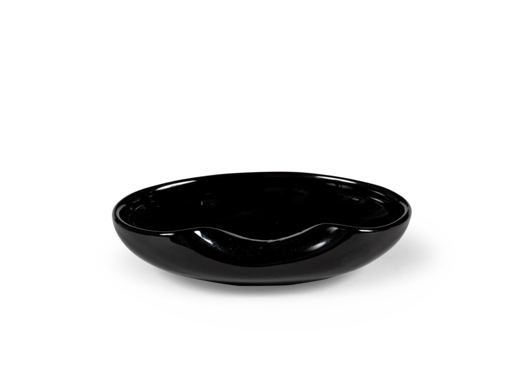 View full screen - View 1 of Lot 2115. Elsa Peretti for Tiffany & Co, A black glass dish, Thumbprint" model | Elsa Peretti pour Tiffany & Co, Coupe en verre noir, modèle "Thumbprint".