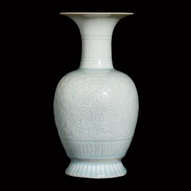 View full screen - View 1 of Lot 31. A carved qingbai 'chrysanthemum' vase Song dynasty | 宋 青白釉纏枝菊花紋撇口瓶.