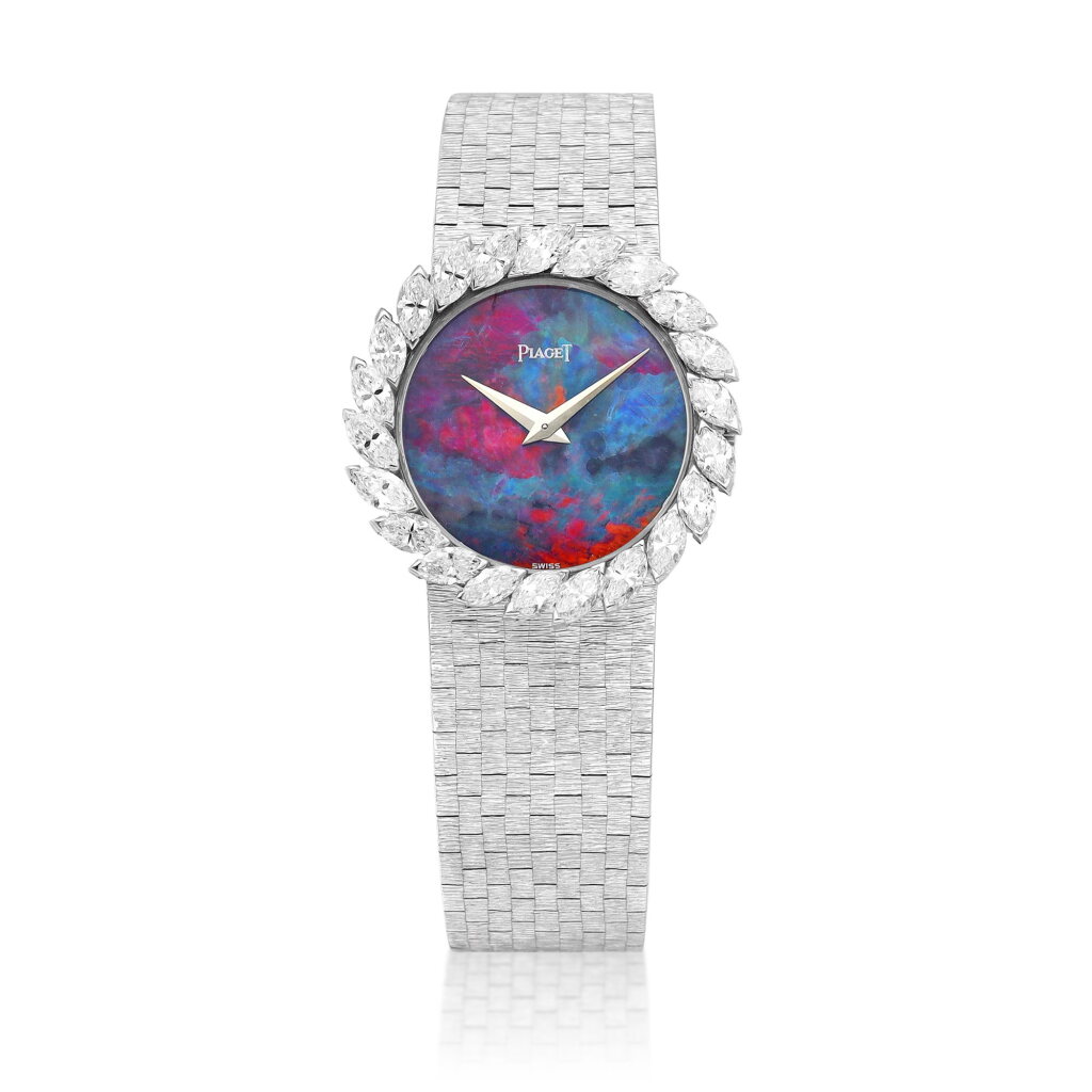 View full screen - View 1 of Lot 8644. Reference 924 | A white gold and diamond-set bracelet watch with opal dial, Circa 1970 | 伯爵 | 型號924 | 白金鑲鑽石鏈帶腕錶,備蛋白石錶盤,約1970年製.