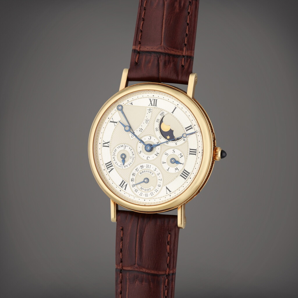 View full screen - View 1 of Lot 103. Reference 3310 Classique | A yellow gold automatic perpetual calendar wristwatch with moon phases, and power reserve indication, Circa 1990.