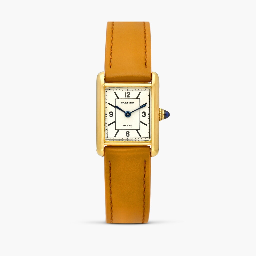 View full screen - View 1 of Lot 2498. New York retailed | Tank L.C. | A rectangular yellow gold wristwatch with unusual sector dial and gold deployant buckle, Circa 1968.