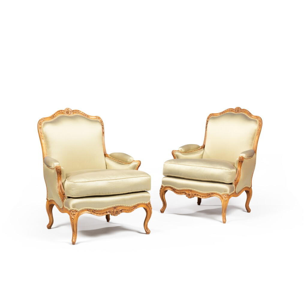 View full screen - View 1 of Lot 65. A pair of Louis XV beechwood bergeres, circa 1750, stamped by Jean Avisse | Paire de bergère en hêtre d'époque Louis XV, vers 1750, estampille de Jean Avisse.