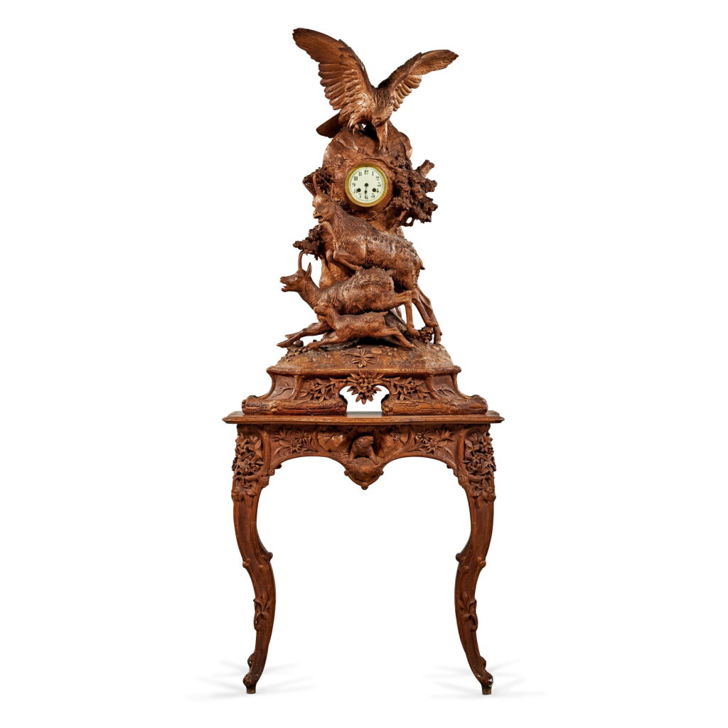 View full screen - View 1 of Lot 668. A Swiss Black Forest Carved Lindenwood Figural Clock , Circa 1880.