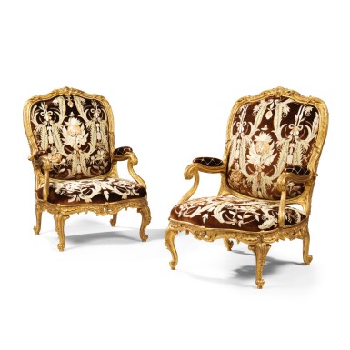 View full screen - View 1 of Lot 24. A pair of Austrian rococo carved giltwood armchairs, Vienna, mid-18th century.