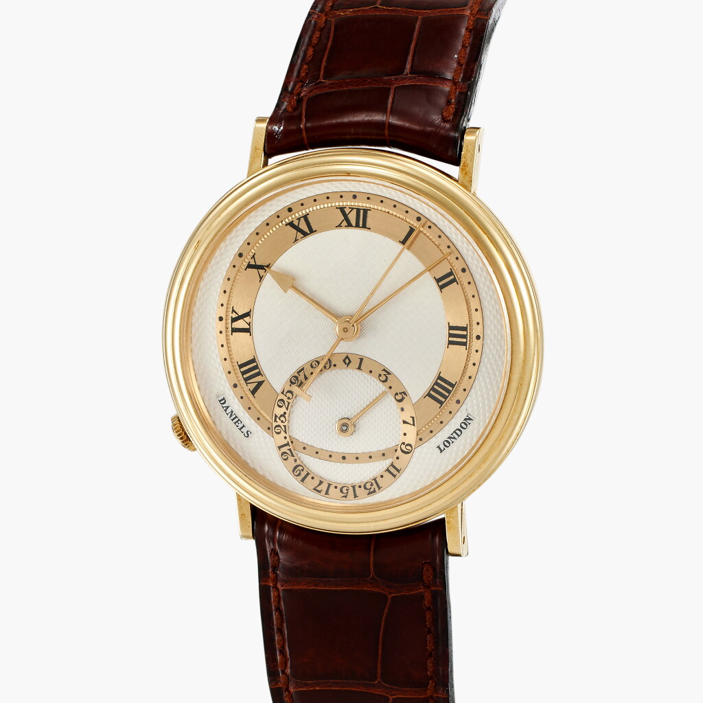 View full screen - View of Millennium | A limited edition yellow gold wristwatch with date | Made in 2001.