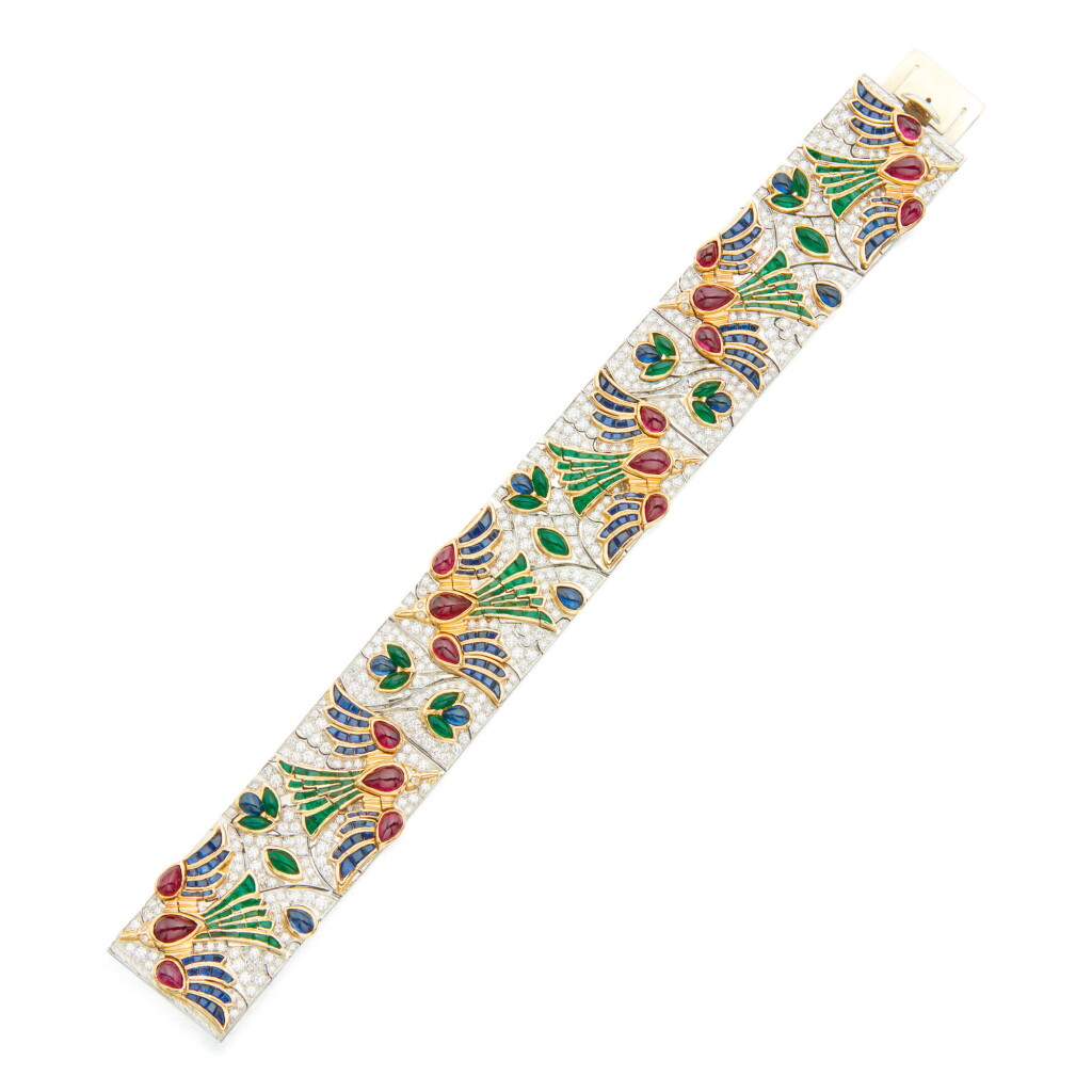 View full screen - View 1 of Lot 65. RUBY, SAPPHIRE EMERALD AND DIAMOND BRACELET, OSCAR HEYMAN & BROTHERS.