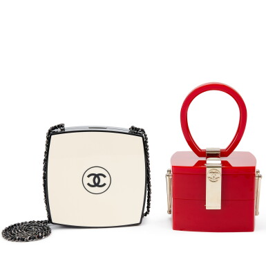 View full screen - View 1 of Lot 1122. Set of Two Black and Beige Lucite Powder Compact with Chain Silver Hardware, 2015-16 and Red Lucite Top Handle Vanity Case Clutch Pale Gold Hardware, 2016-17.