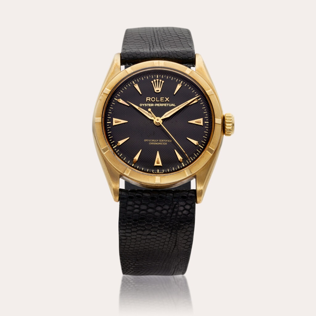 View full screen - View 1 of Lot 618. Reference 6085 Oyster Perpetual | A yellow gold automatic wristwatch, Circa 1963.