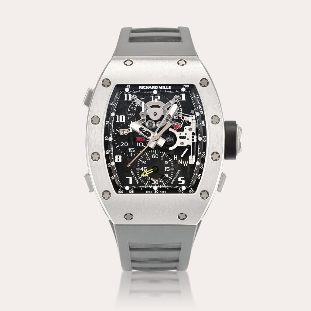 View full screen - View 1 of Lot 2207. Reference RM004 AG | A limited edition white gold semi-skeletonised split seconds chronograph wristwatch with power reserve and torque indication, Circa 2017.