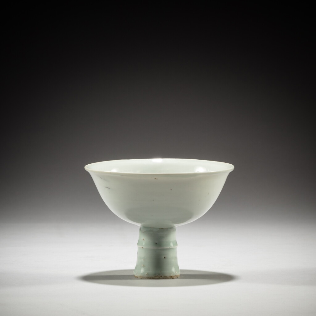 View full screen - View 1 of Lot 45. A white-glazed ritual stem bowl, Yuan dynasty | 元 白釉高足盃.