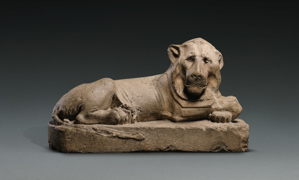 View full screen - View 1 of Lot 57. AN EGYPTIAN LIMESTONE FIGURE OF A LION, 30TH DYNASTY, 380-342 B.C..