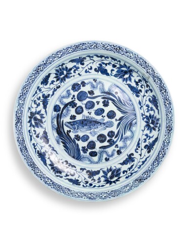 View full screen - View 1 of Lot 5039. A blue and white 'fish' charger, Yuan dynasty | 元 青花魚藻紋折沿盤.