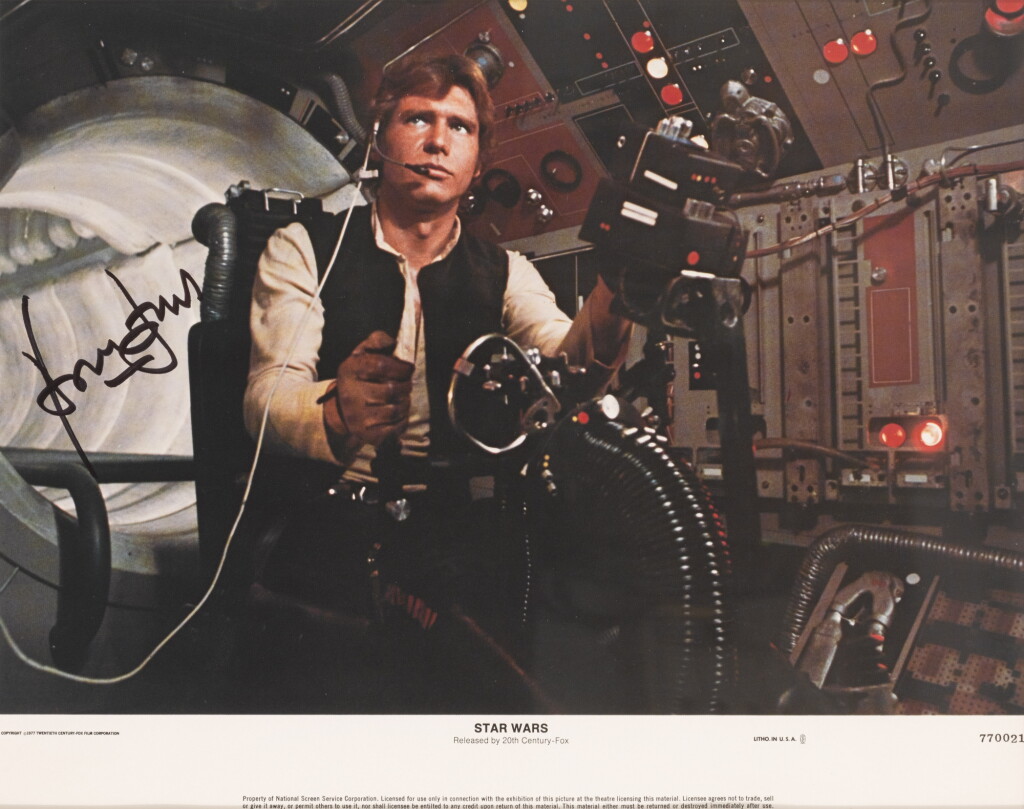 View full screen - View 1 of Lot 84. Star Wars (1977), lobby card, signed by Harrison Ford, US.