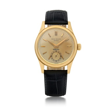 View full screen - View 1 of Lot 406. RETAILED BY LÖRTSCHER: CALATRAVA, REF 2483 YELLOW GOLD WRISTWATCH MADE IN 1952.