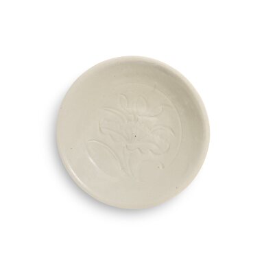 View full screen - View 1 of Lot 322. A carved 'Ding' 'lotus' dish, Northern Song dynasty | 北宋 定窰白釉刻蓮花紋盤.