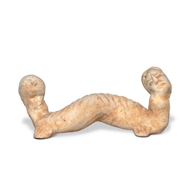 View full screen - View 1 of Lot 12. A rare pottery figure of a two-headed beast, Northern Wei dynasty.