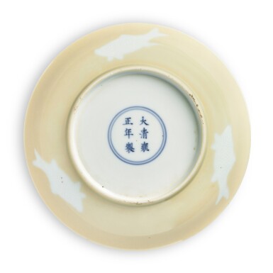 View full screen - View 1 of Lot 125. A café-au-lait-glazed 'three fish' dish, Mark and period of Yongzheng | 清雍正 米黃釉三魚紋盤 《大清雍正年製》款.
