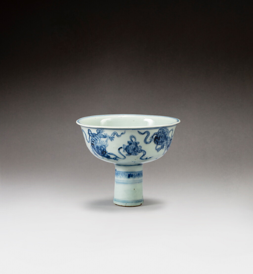 View full screen - View 1 of Lot 82. A blue and white 'buddhist lion' stem cup, Ming dynasty, 16th century | 明十六世紀 青花佛獅紋高足盃.