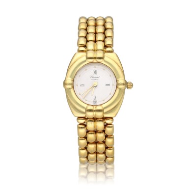 View full screen - View 1 of Lot 350. Reference 325120-0001 | A yellow gold bracelet watch with date, Circa 1995.