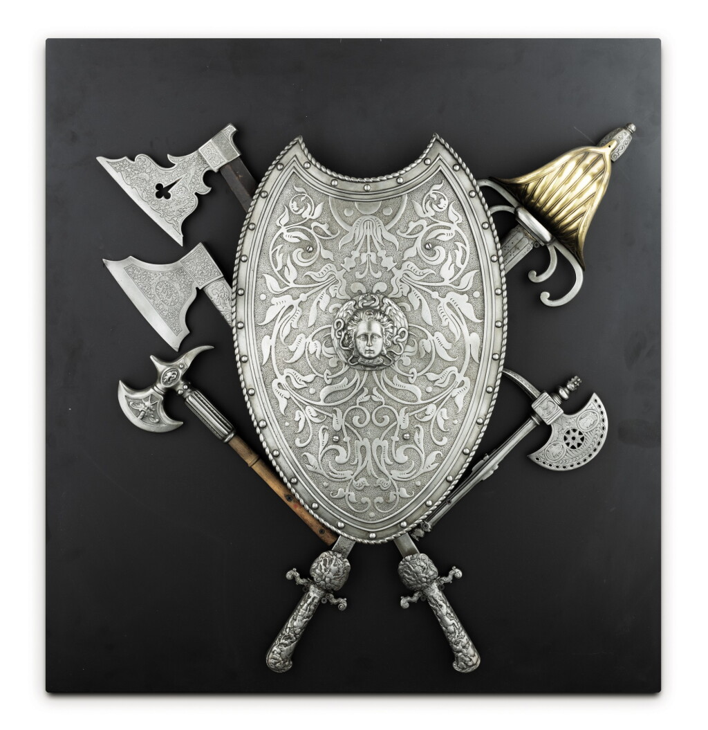 View full screen - View 1 of Lot 281. An English steel and brass ornamental armorial applique,.