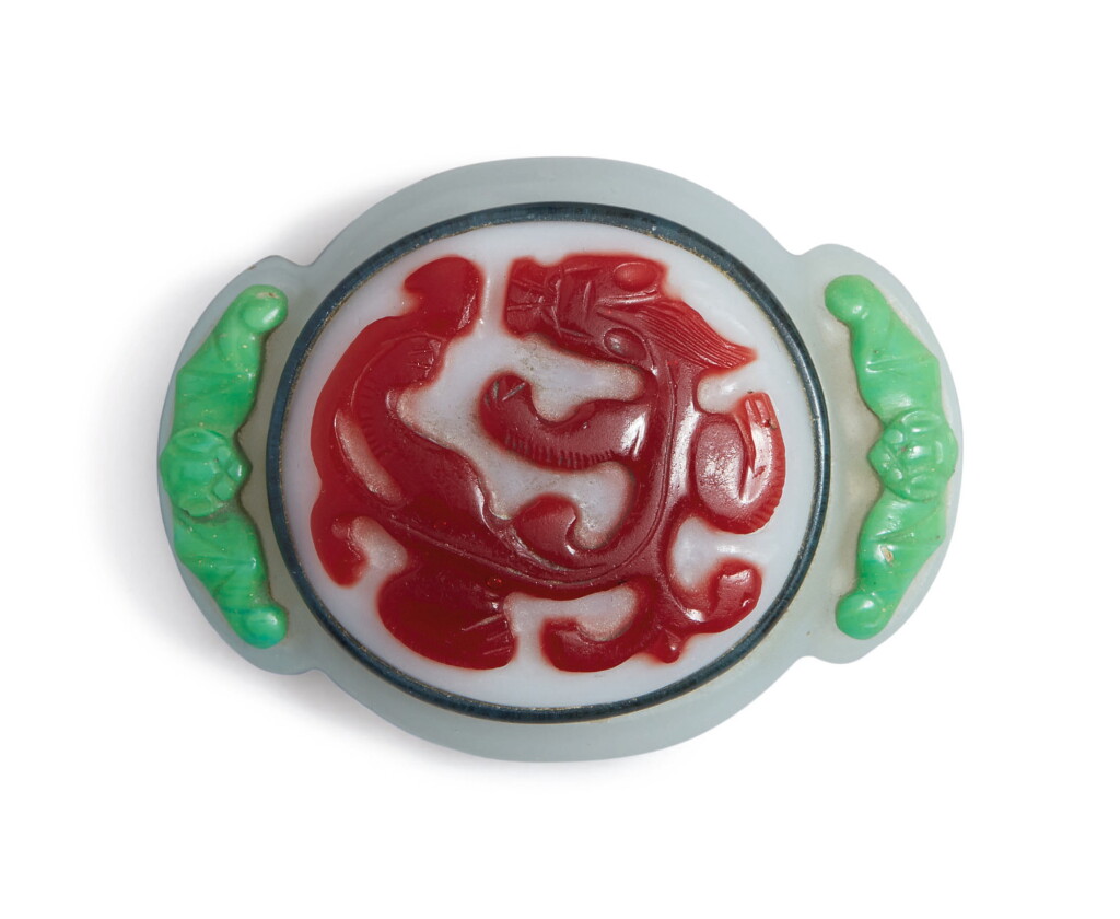 View full screen - View 1 of Lot 1021. AN UNUSUAL POLYCHROME OVERLAY GLASS 'CHILONG' BELT BUCKLE.