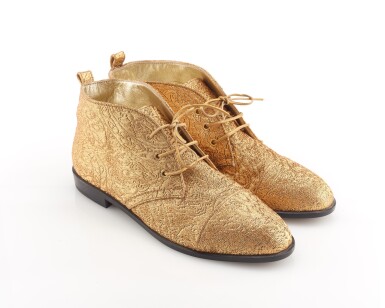 View full screen - View 1 of Lot 65. Pair of gold embroidered fabric and leather ankle boots.