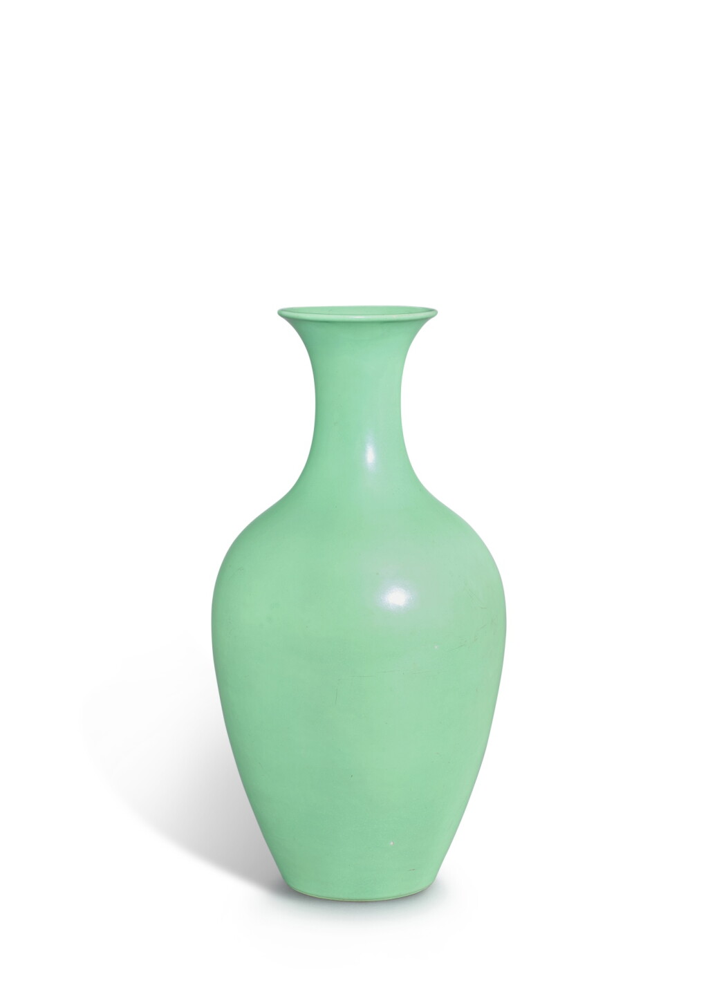 View full screen - View 1 of Lot 3647. A rare pistachio-green enamelled vase, Mark and period of Yongzheng | 清雍正 綠彩撇口瓶 《大清雍正年製》款.
