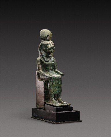 View full screen - View 1 of Lot 38. An Egyptian Bronze Figure of a Lion-Headed Goddess, 26th Dynasty, 664-525 B.C..