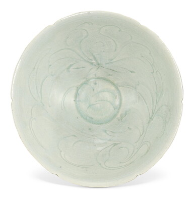 View full screen - View 1 of Lot 309. A QINGBAI CARVED 'PEONY' BOWL SOUTHERN SONG DYNASTY | 南宋 青白釉牡丹紋笠式葵口盌.