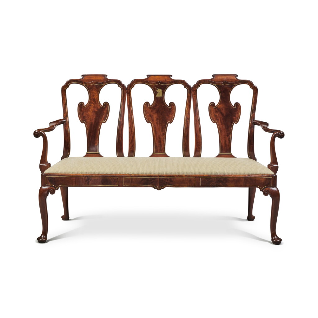 View full screen - View 1 of Lot 6. A George II Brass-Inlaid Padouk Triple-Chairback Settee, circa 1730.
