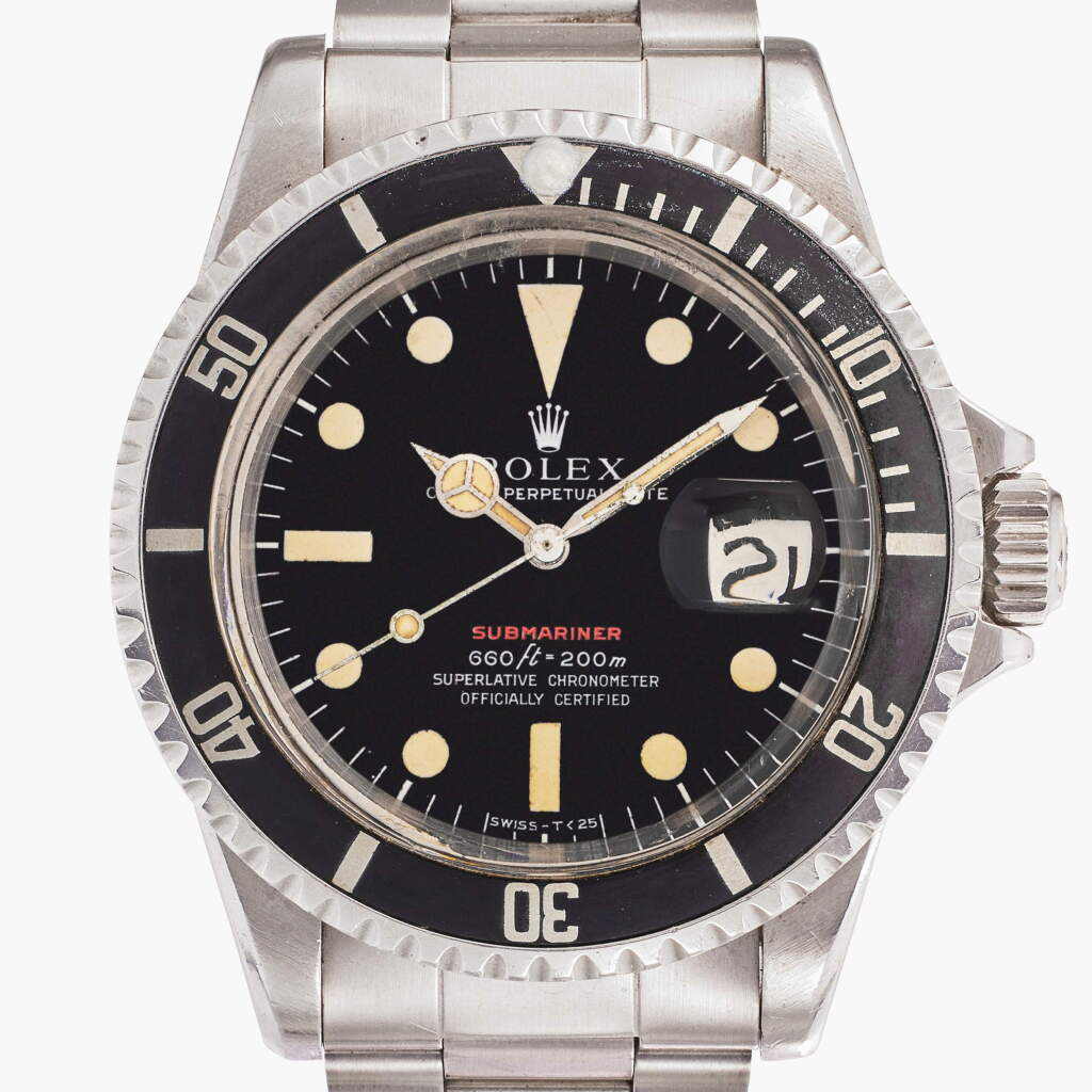 View full screen - View 1 of Lot 14. Reference 1680 'Red' Submariner | A stainless steel automatic wristwatch with date and bracelet, Circa 1973.