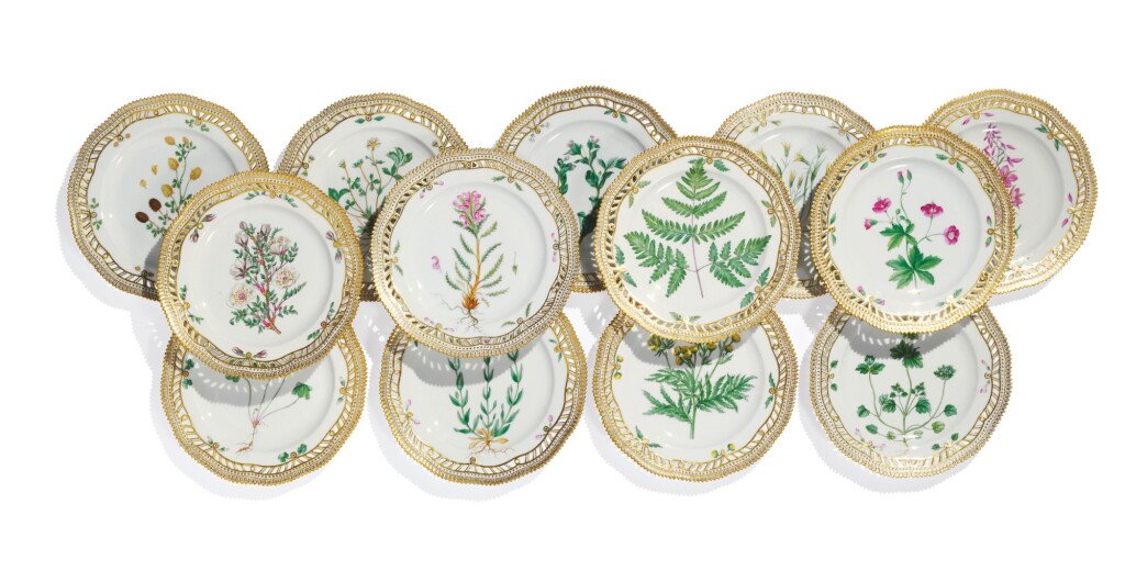 View full screen - View 1 of Lot 959. TWENTY-ONE ROYAL COPENHAGEN 'FLORA DANICA' RETICULATED LUNCHEON PLATES, 19TH CENTURY AND LATER.