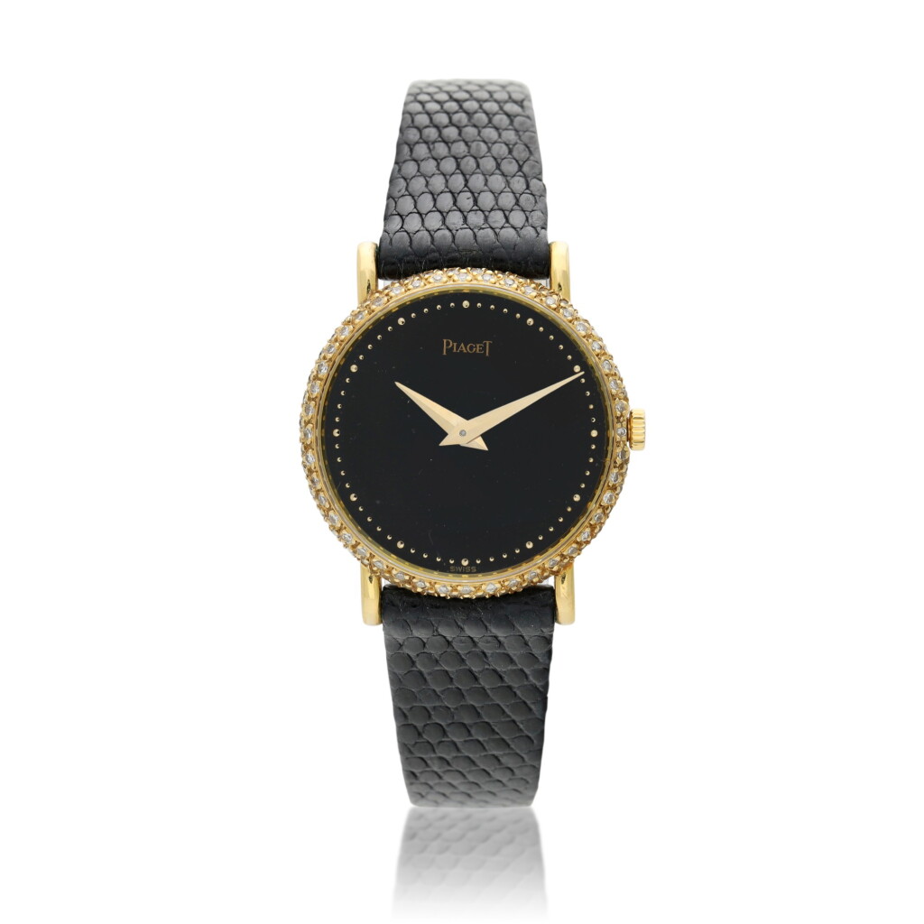 View full screen - View 1 of Lot 161. Reference 9007, A yellow gold and diamond-set wristwatch, Circa 1969.